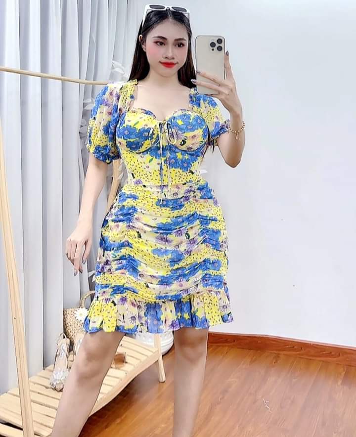Sunkissed Style Vietnam Padded Chiffon Dress showcasing a vibrant yellow and blue floral print.